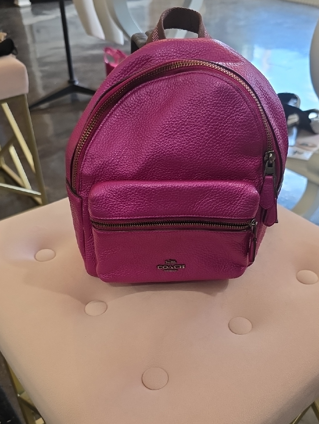Coach Pebbled Leather Mini Backpack In Fuchsia Pink